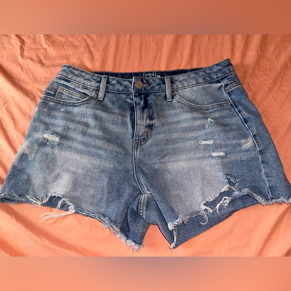 Distressed high rise denim shorts